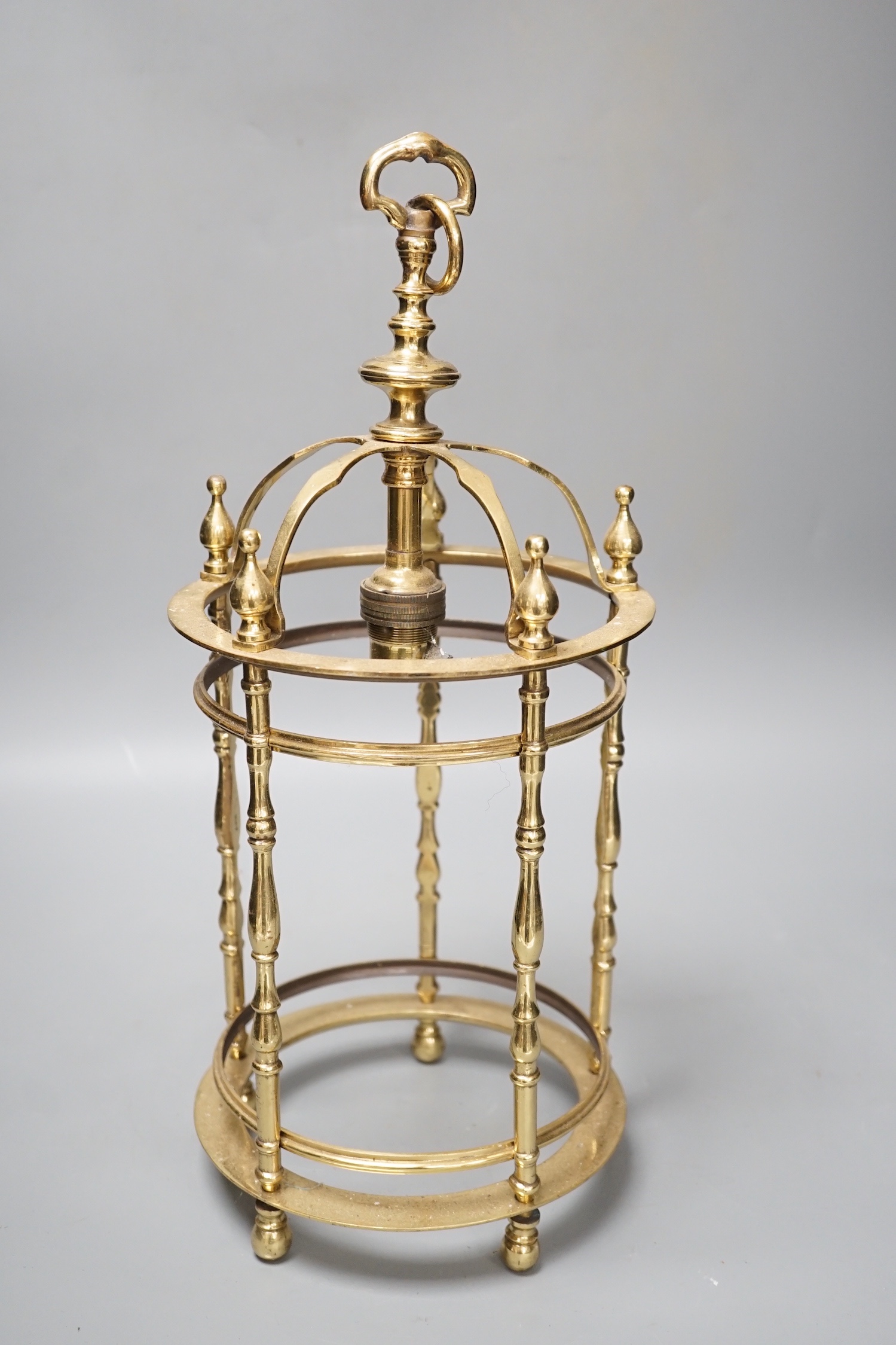 A brass ceiling lantern, lacking glass, 41cm high